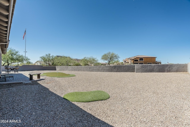 4126 S Last Chance Trl, Gold Canyon, AZ 85118 - fenced backyard with an area to practice putting