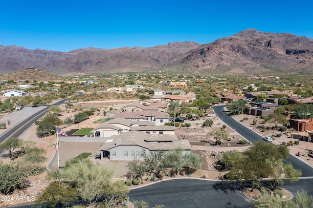 4126 S Last Chance Trl, Gold Canyon, AZ 85118 - aerial overview of property's location featuring a mountain backdrop and nearby suburban area