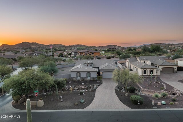 4126 S Last Chance Trl, Gold Canyon, AZ 85118 - view of front of house with an attached garage, a residential view, driveway, and stucco siding