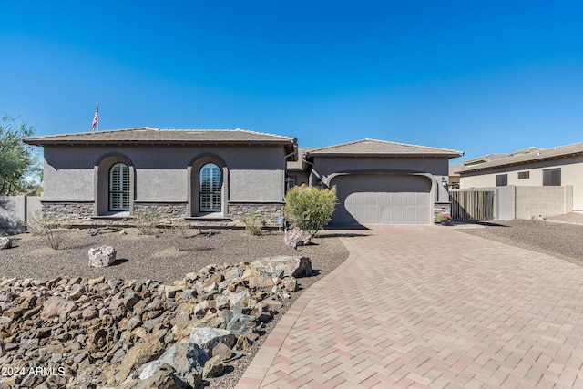 4126 S Last Chance Trl, Gold Canyon, AZ 85118 - view of front of property with stucco siding, stone siding, and an attached garage