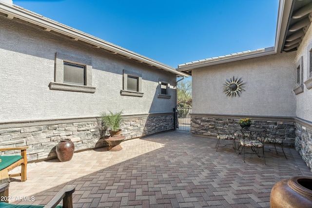4126 S Last Chance Trl, Gold Canyon, AZ 85118 - view of patio with a gate