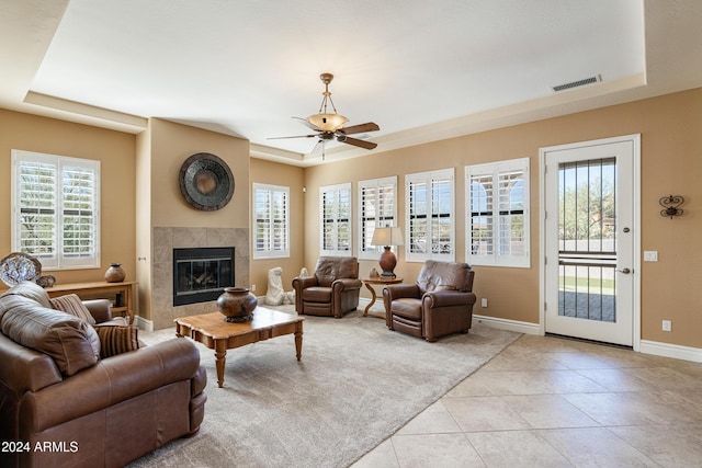 4126 S Last Chance Trl, Gold Canyon, AZ 85118 - living room featuring plenty of natural light, a ceiling fan, light tile patterned floors, and baseboards