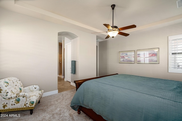 4126 S Last Chance Trl, Gold Canyon, AZ 85118 - carpeted bedroom featuring arched walkways, a ceiling fan, and baseboards