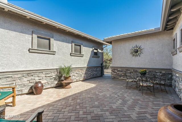 4126 S Last Chance Trl, Gold Canyon, AZ 85118 - view of patio with a gate