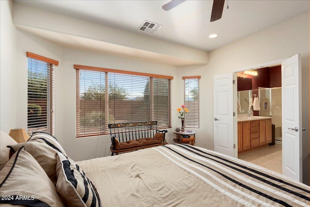 bedroom with ceiling fan and ensuite bathroom