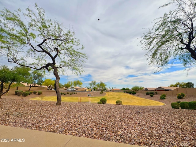 view of yard featuring fence