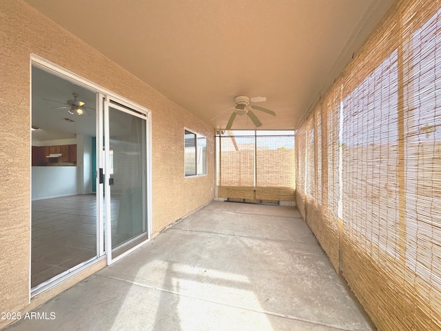 view of patio featuring a ceiling fan