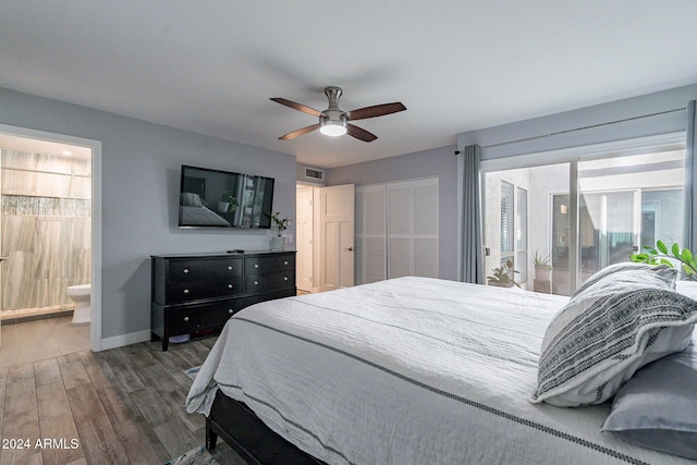 bedroom with visible vents, ceiling fan, connected bathroom, wood finished floors, and baseboards