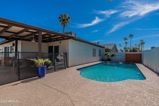 view of swimming pool with a fenced in pool, a patio area, and a fenced backyard