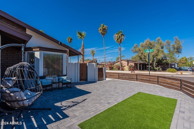 view of patio / terrace with fence