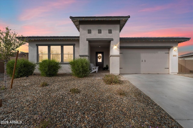 view of front of home featuring a garage