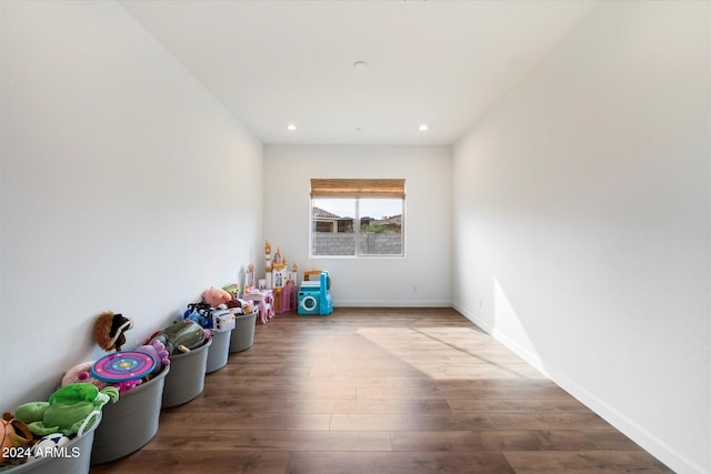 game room featuring hardwood / wood-style floors