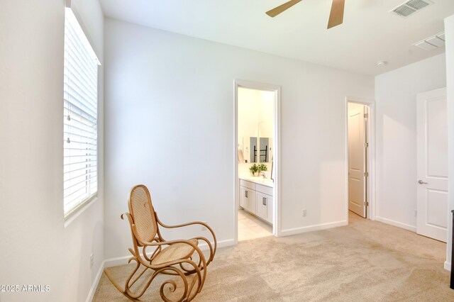 28722 N 133rd Ln, Peoria, AZ 85383 - sitting room with visible vents, a ceiling fan, baseboards, and light carpet
