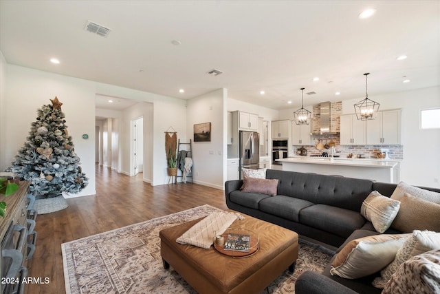 living room featuring dark hardwood / wood-style flooring