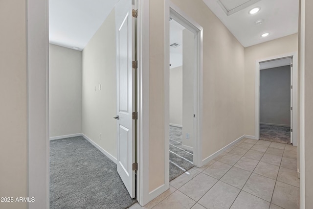 8027 W Northview Ave, Glendale, AZ 85303 - hallway featuring light colored carpet, light tile patterned floors, and recessed lighting