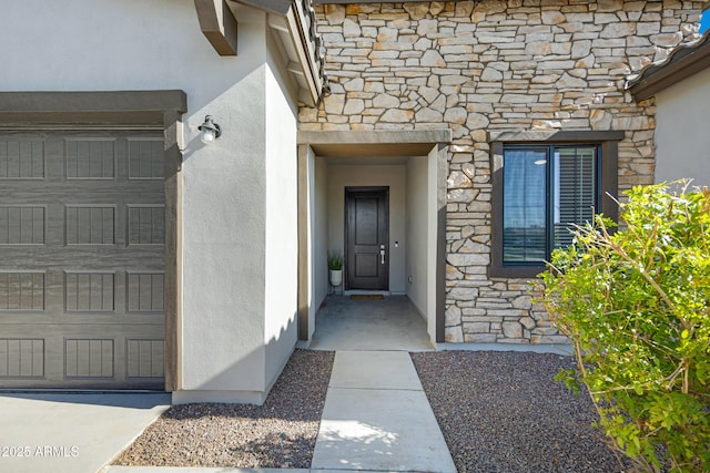 8027 W Northview Ave, Glendale, AZ 85303 - view of exterior entry featuring stone siding and stucco siding