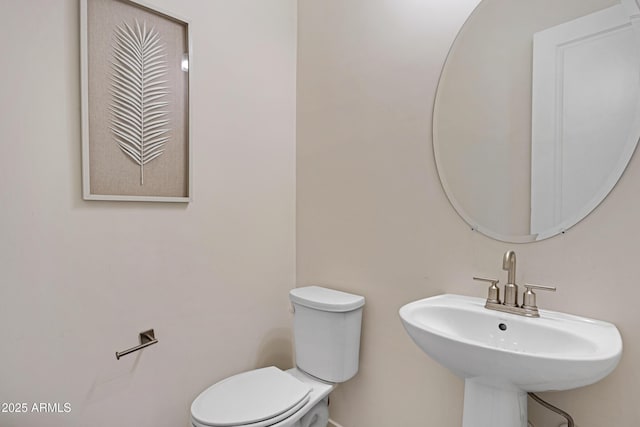 8027 W Northview Ave, Glendale, AZ 85303 - half bathroom with a sink and toilet