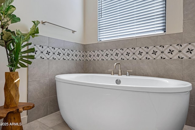 8027 W Northview Ave, Glendale, AZ 85303 - full bathroom featuring a freestanding tub, tile walls, and tile patterned floors