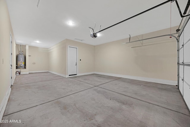 8027 W Northview Ave, Glendale, AZ 85303 - garage featuring water heater and a garage door opener