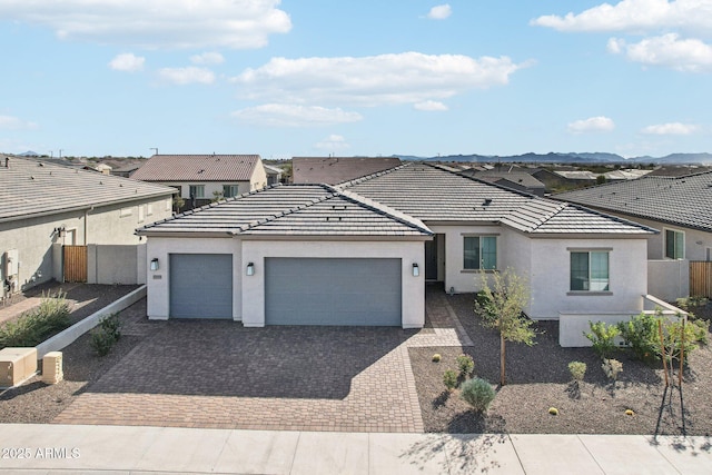 view of front of house with a garage