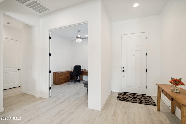 foyer entrance featuring light hardwood / wood-style floors