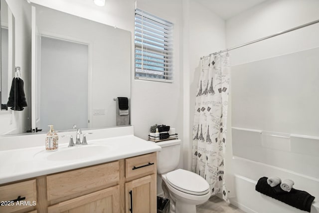 full bathroom with toilet, vanity, and shower / bathtub combination with curtain