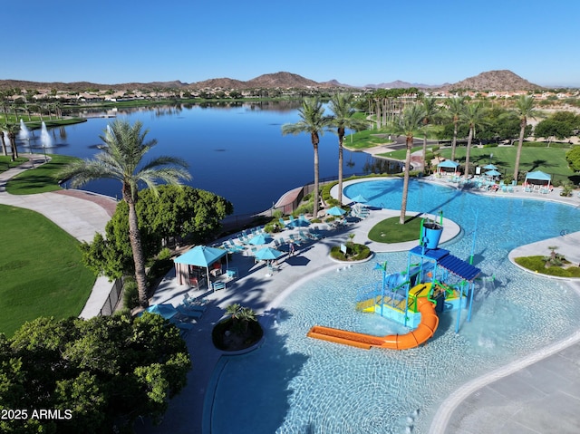 bird's eye view featuring a water and mountain view