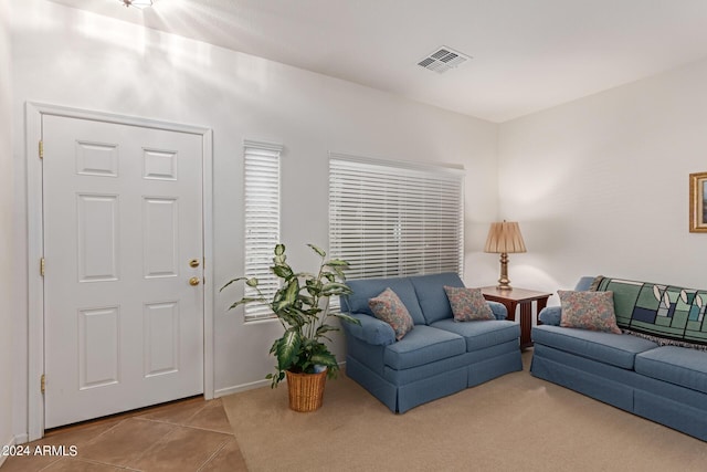 tiled living room with visible vents