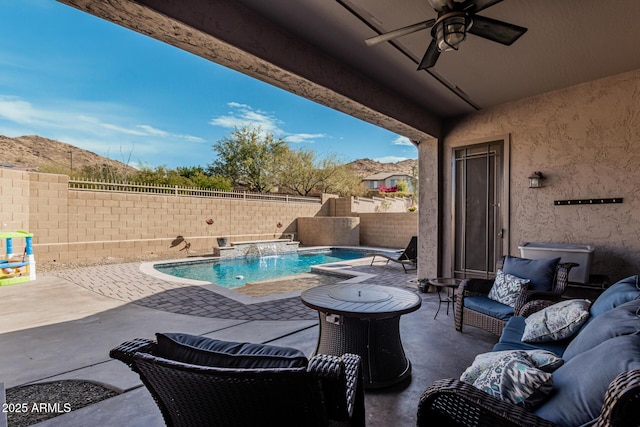 view of patio featuring pool water feature and ceiling fan