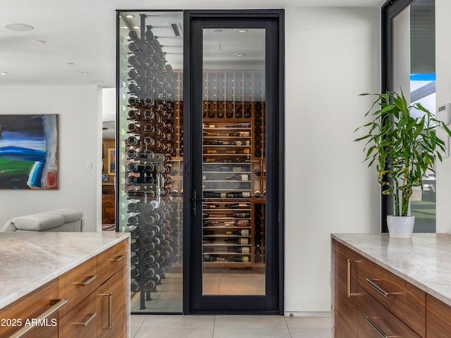 wine cellar with light tile patterned floors