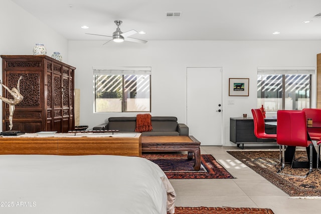 bedroom featuring light tile patterned floors, a ceiling fan, visible vents, and recessed lighting