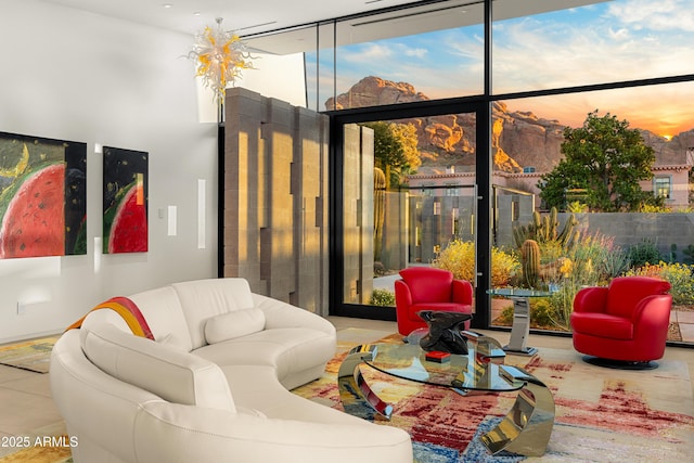 living area featuring floor to ceiling windows