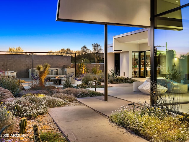 view of patio featuring fence