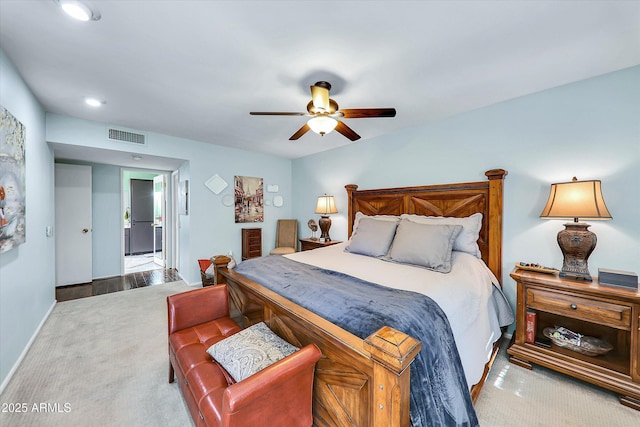 carpeted bedroom with ceiling fan