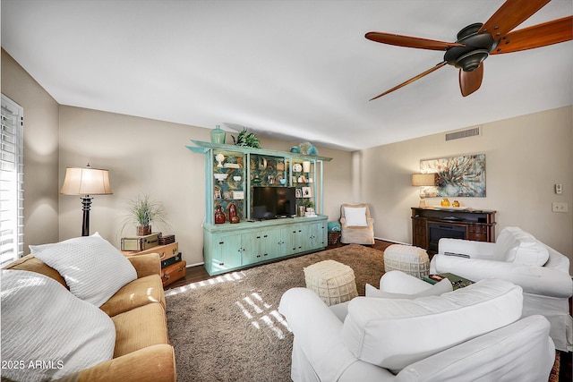 living room with ceiling fan