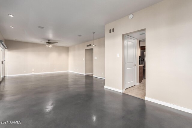 unfurnished room with ceiling fan