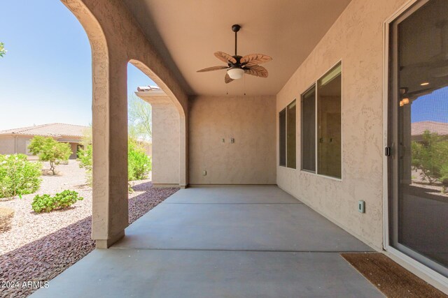 view of patio featuring ceiling fan