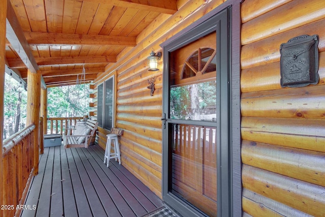 wooden terrace with covered porch