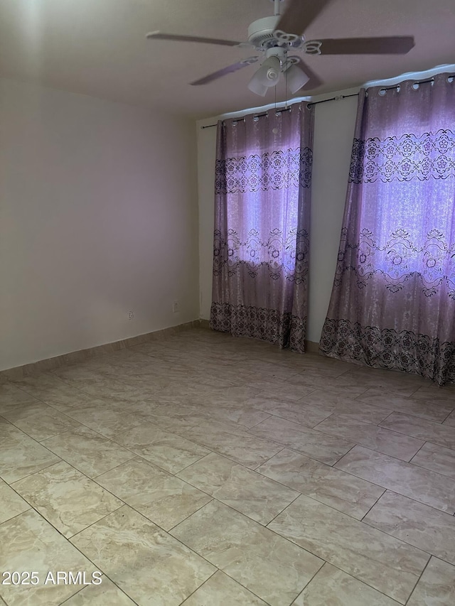 8110 N 31st Dr, Phoenix, AZ 85051 - spare room featuring a ceiling fan