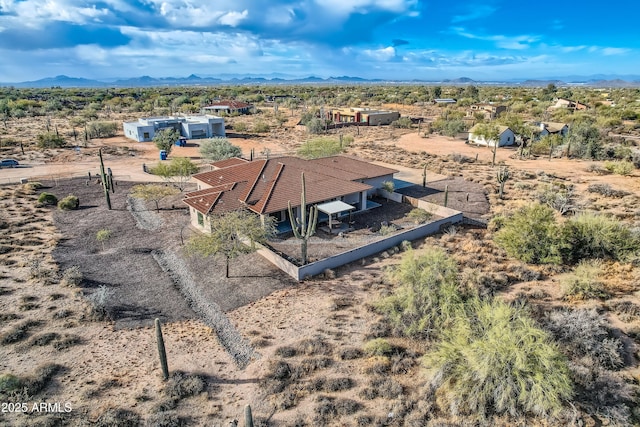 aerial view with view of desert and a mountain view