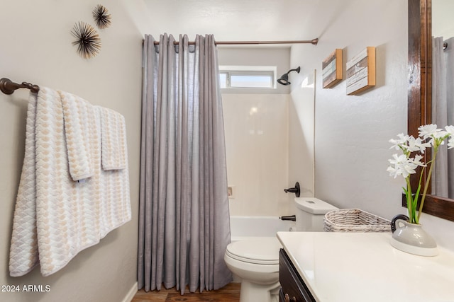 full bathroom featuring vanity, toilet, and shower / bathtub combination with curtain