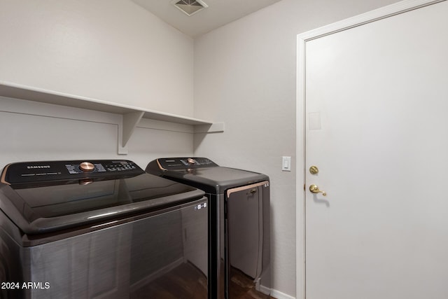 laundry area featuring washer and clothes dryer