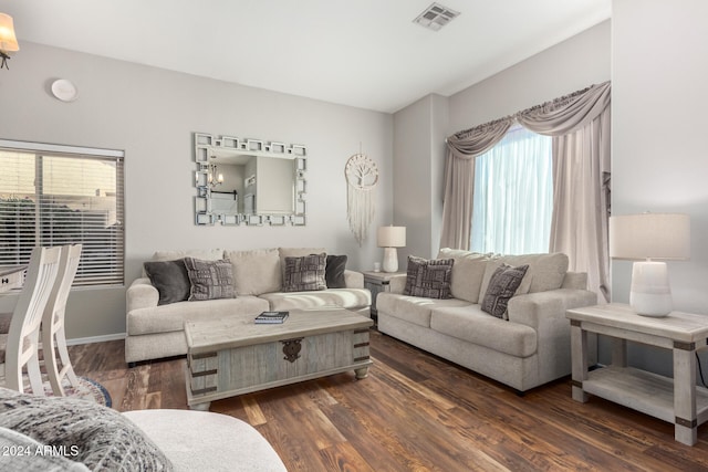 living room featuring dark hardwood / wood-style flooring