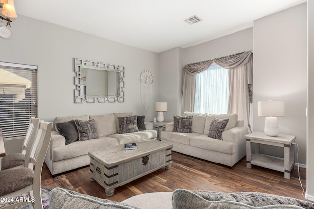 living room with dark wood-type flooring