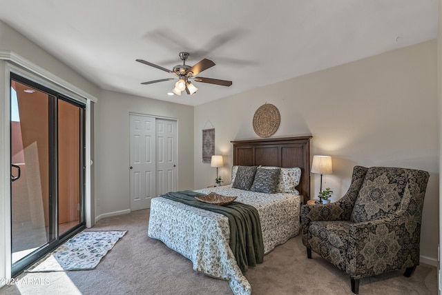 carpeted bedroom featuring a closet and ceiling fan