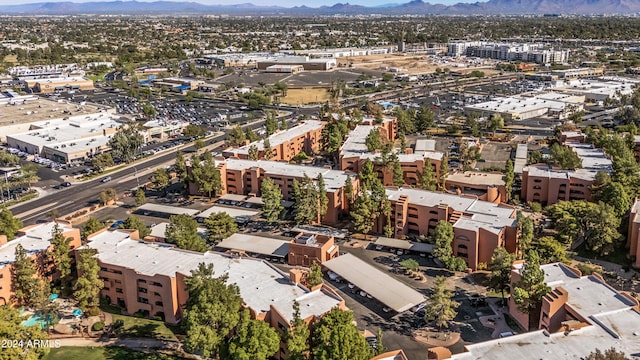 birds eye view of property featuring a mountain view