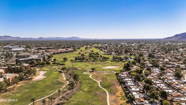 birds eye view of property featuring a mountain view