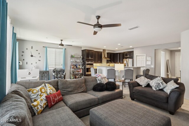 26049 W Matthew Dr, Buckeye, AZ 85396 - living area featuring recessed lighting, visible vents, and ceiling fan