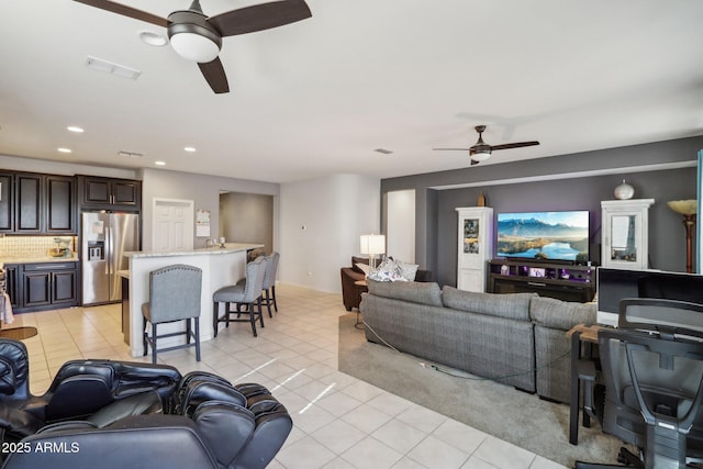 26049 W Matthew Dr, Buckeye, AZ 85396 - living area featuring recessed lighting, light tile patterned floors, visible vents, and a ceiling fan
