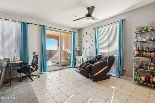26049 W Matthew Dr, Buckeye, AZ 85396 - sitting room featuring baseboards, a ceiling fan, and tile patterned flooring